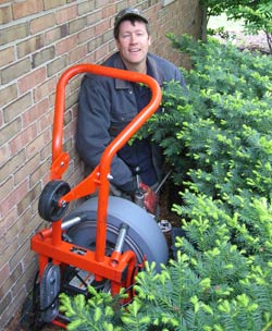 Cleaning a Sewer Drain with Rotary Drum Machine